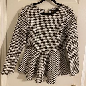 Eros apparel black and white peplum top.  Size large.  Never worn.